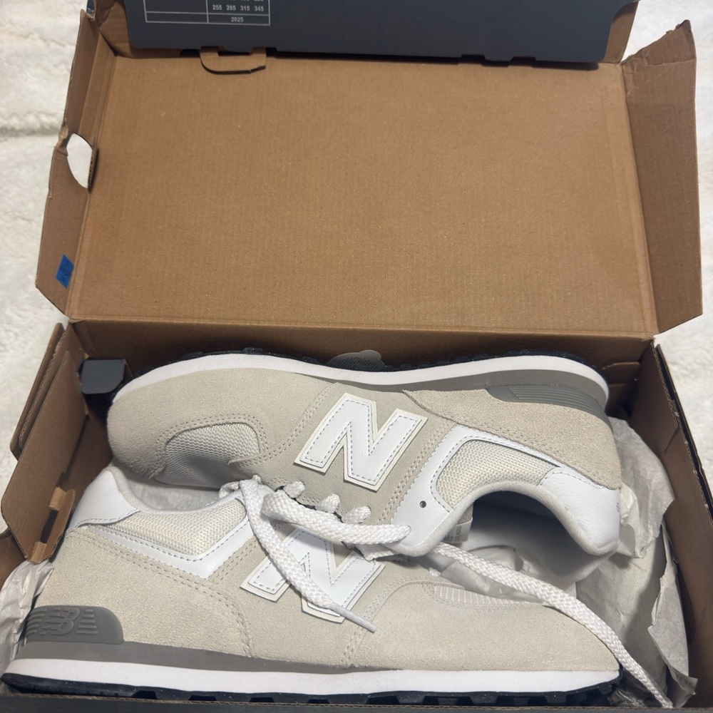 New Balance Big kids Cream and White Sneakers
